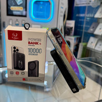 Retail display featuring an iPhoenix 10000 mAh portable power bank box with a red phoenix logo and an iPhone in a clear case magnetically attached to a black charger, all on a glass shelf against a background of blue illuminated display cabinets