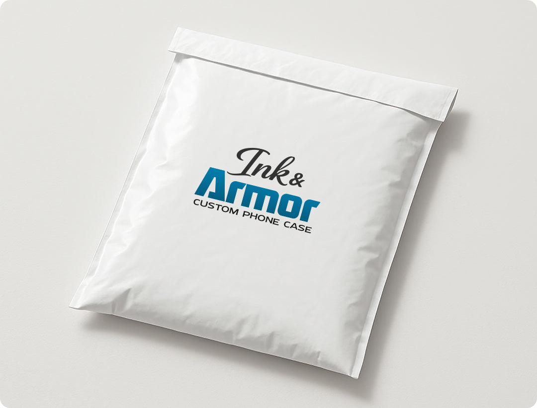 White envelop with 'Ink & Armor' logo on a light gray background