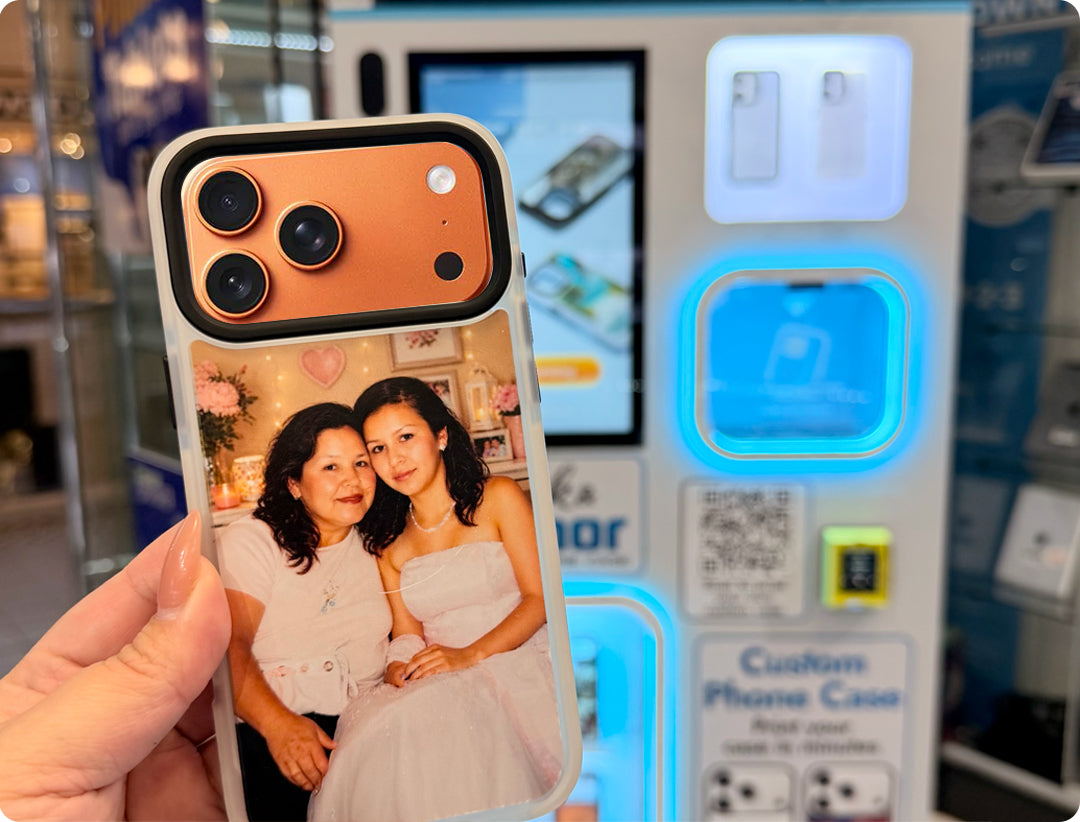 Phone case with two women holding hands in front of a vending machine.